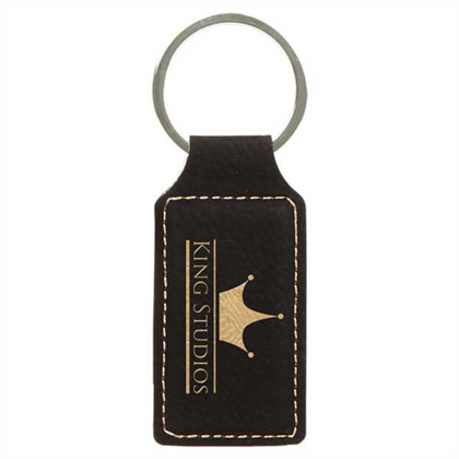 Picture of 2 3/4" x 1 1/4" Black/Gold Laserable Leatherette Rectangle Keychain