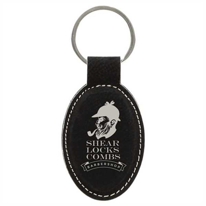 Picture of 3" x 1 3/4" Black/Silver Laserable Leatherette Oval Keychain